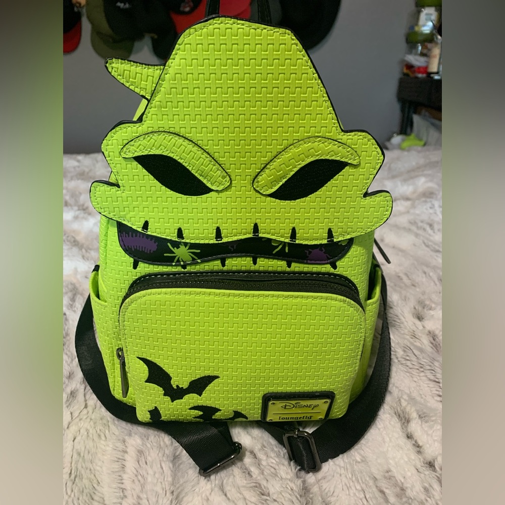 NBC Oogie Boogie GITD Loungefly with matching Mickey ears.